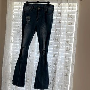 Front & Back light wash denim. Size Large. Never been worn.